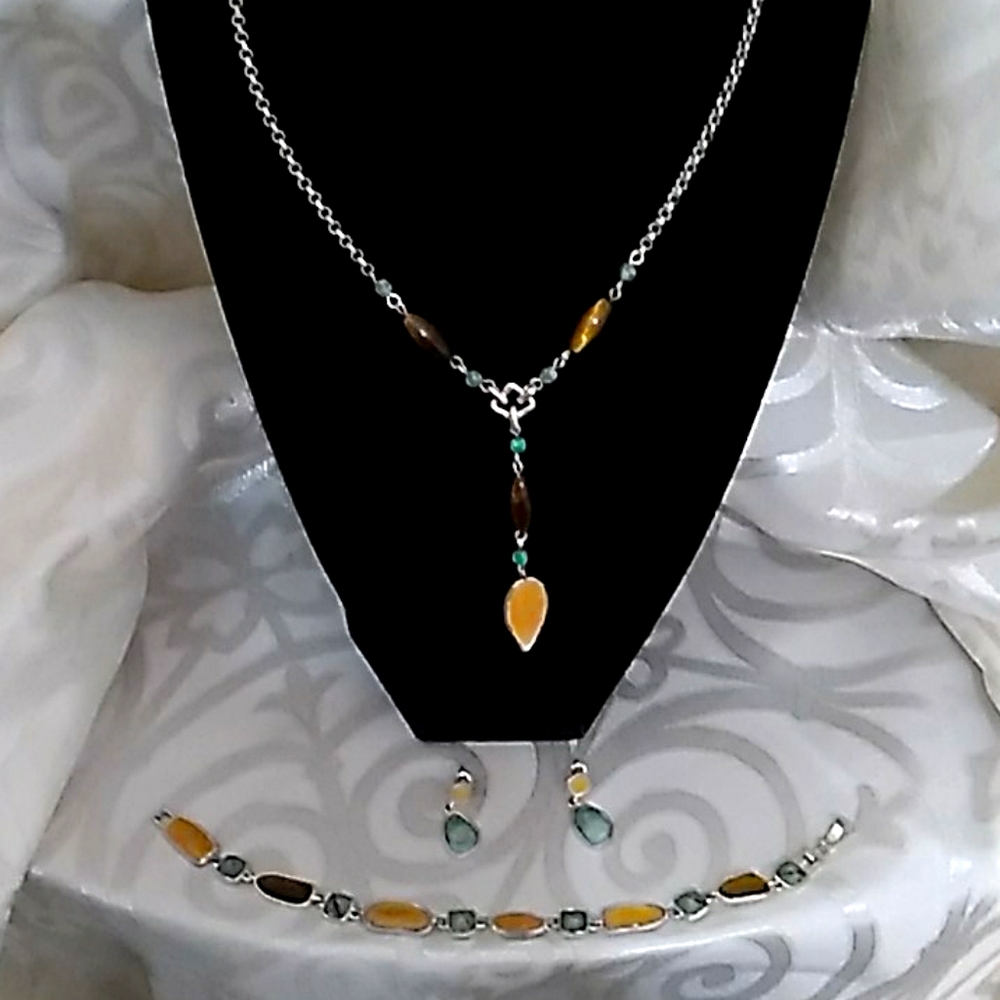 Necklace earrings and bracelet
